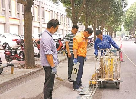 洛江：车位地面嵌入二维码 ，促进车位资源充分利用